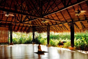 Woman-practicing-Yoga-at-Blue Spirit