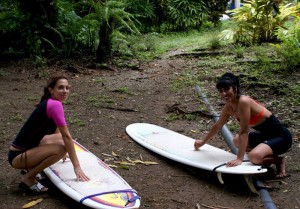 Women with surfing board at