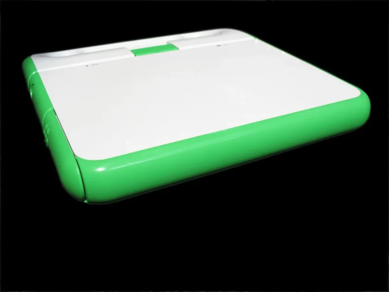 Closed green and white XO laptop from the One Laptop per Child program